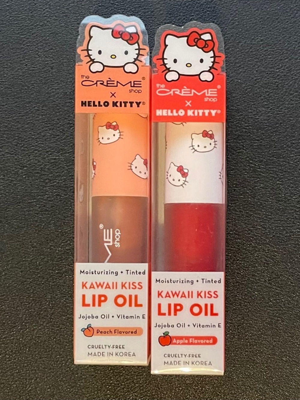 NWT THE CREME SHOP HELLO KITTY KAWAII KISS TINTED APPLE PEACH LIP OILS LOT OF 2